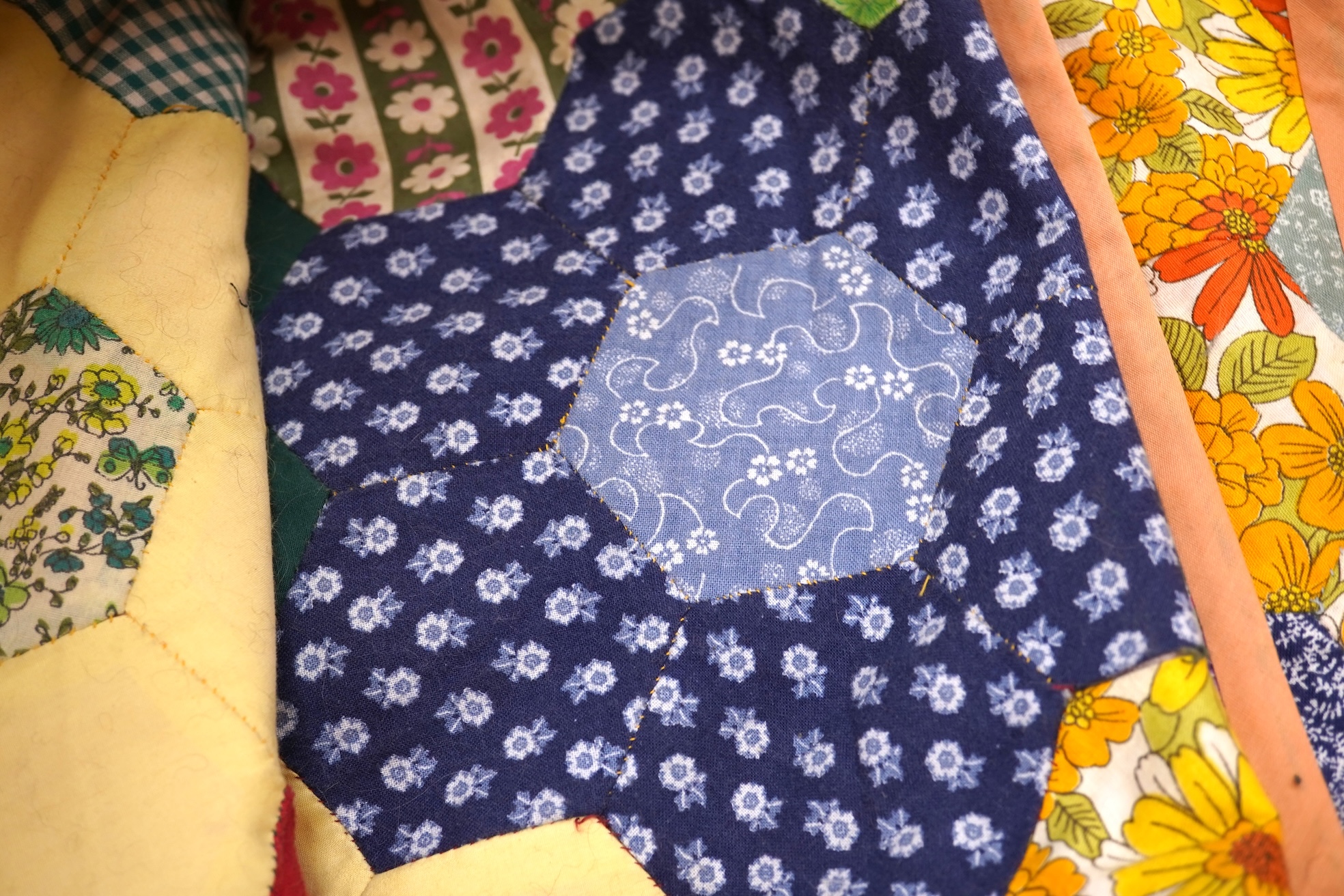 A mid 20th century patchwork quilt